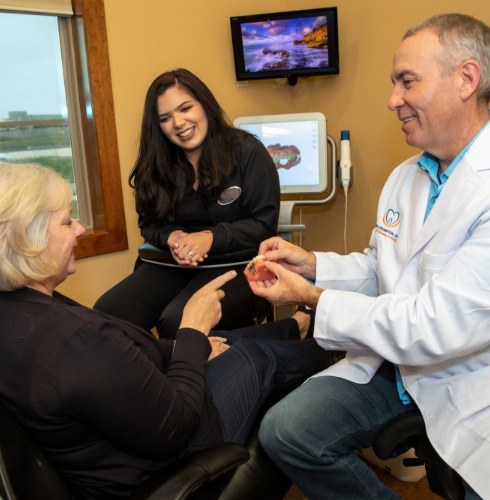 Dr. Crumpton talking with patient